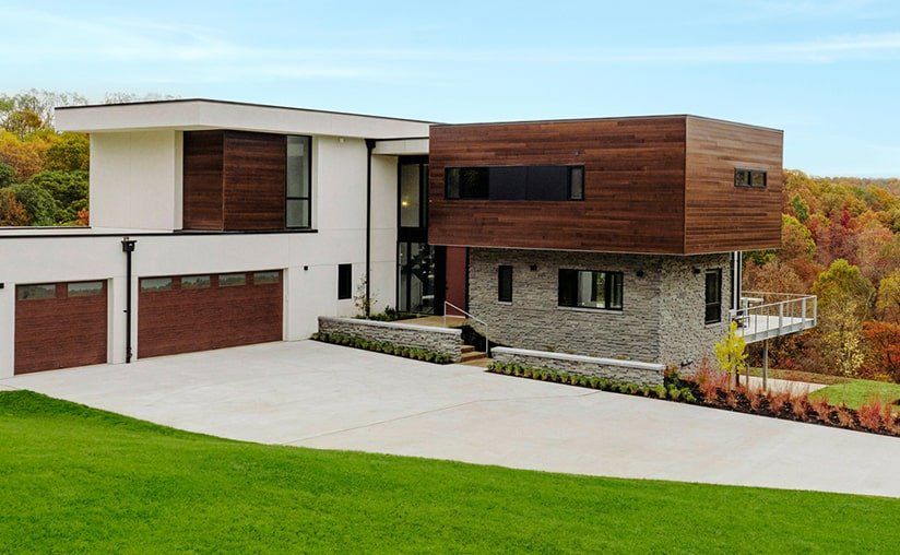 modern-steel-flush-long-window-walnut-garage-door-1920w-1.jpeg