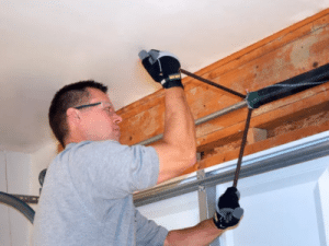 how to tighten garage door springs